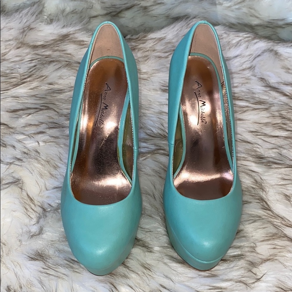 Teal pumps
